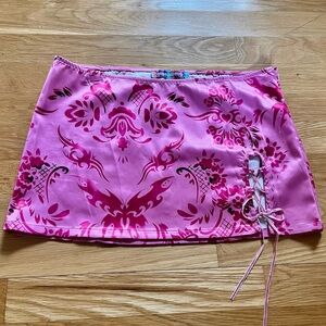Urban Outfitters Small Bright Pink Mini Skirt with Tattoo like Designs